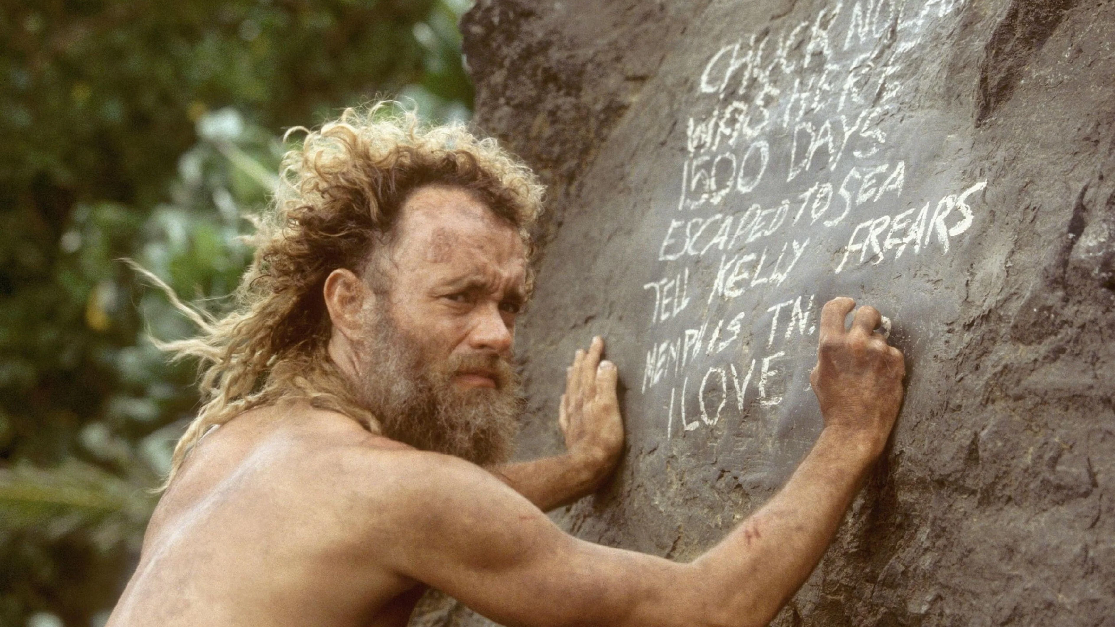 Tom Hanks stranded on a deserted island in Cast Away (2000)