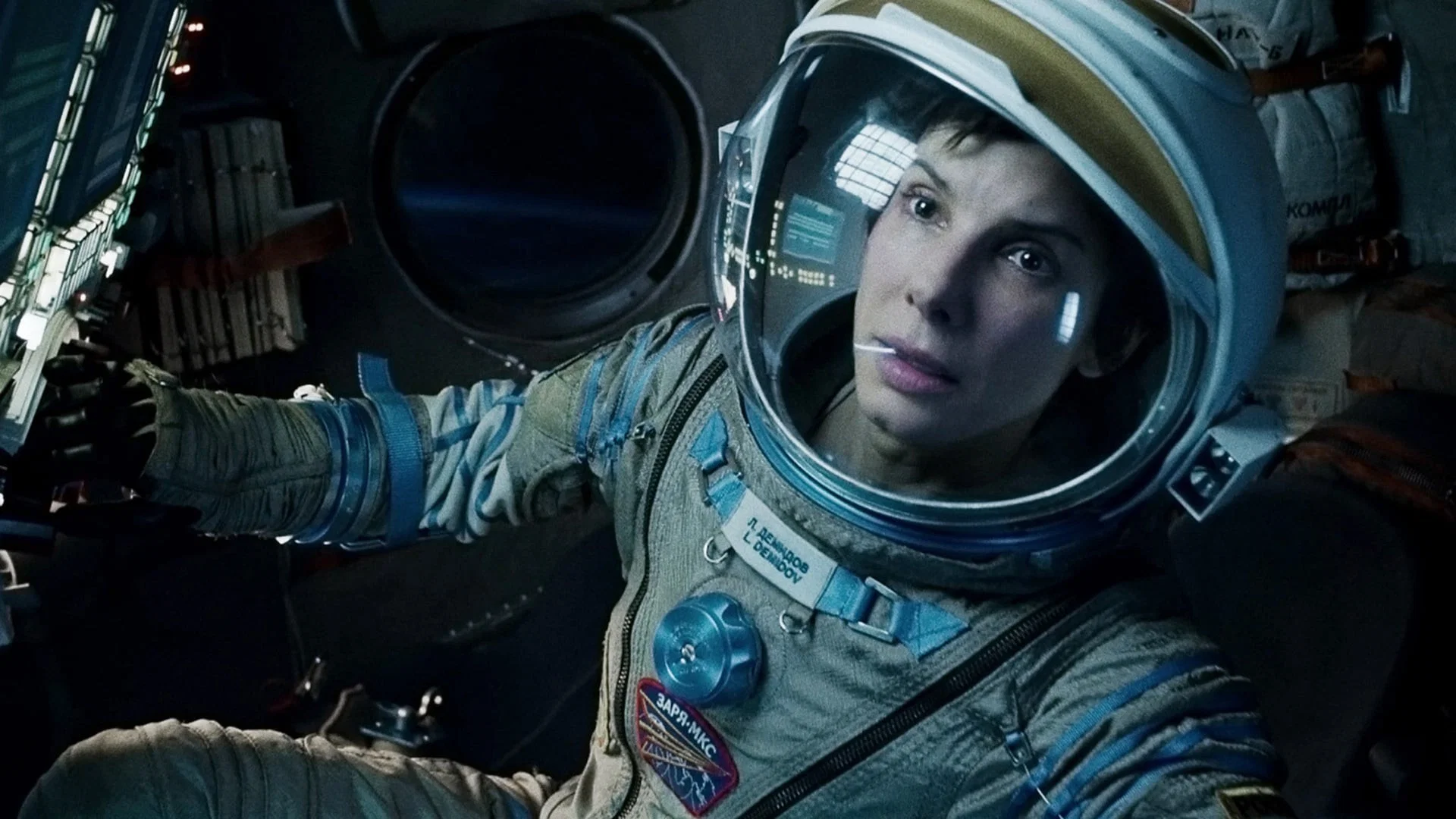 An astronaut drifting above Earth in Gravity (2013)